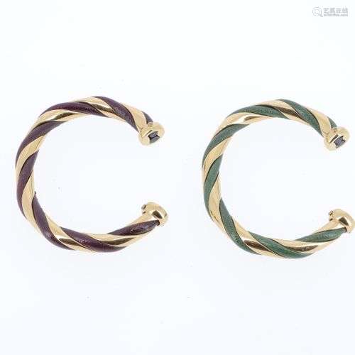 HERMES Paire de bracelets joncs rigides en enroulements de m...