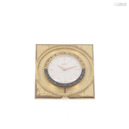 HERMES PARIS Petite horloge en métal doré, cadran fond blanc...