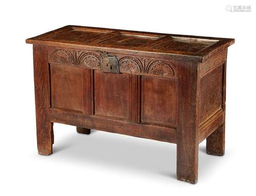 A Charles II oak panelled chest