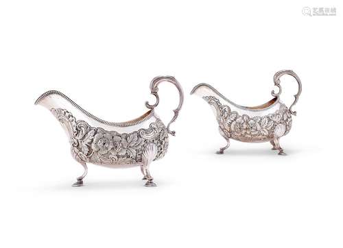 A pair of George III Irish silver sauceboats by Matthew West...