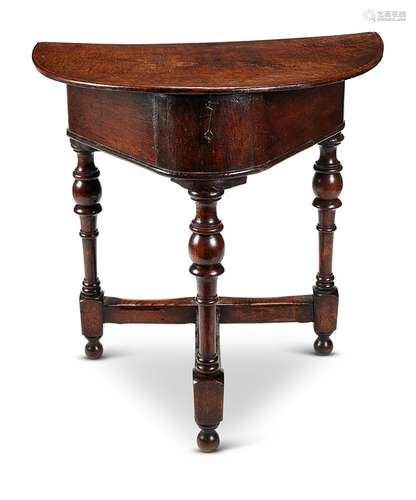 A Queen Anne oak half-round table