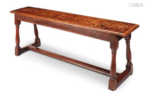 A Charles II elm bench