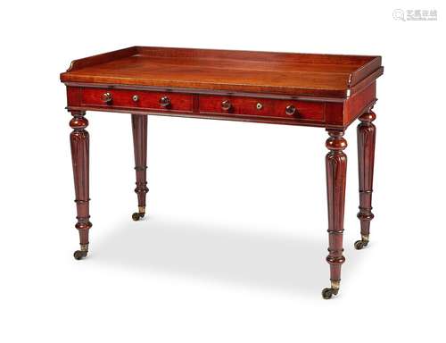 An early Victorian mahogany side table in the manner of Holl...