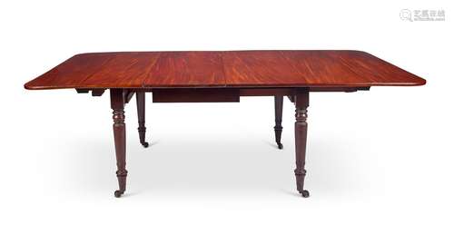 A George IV mahogany drop-flap extending dining table