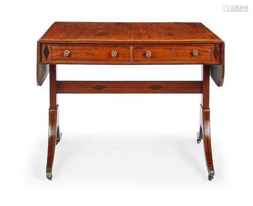 A Regency mahogany and rosewood crossbanded sofa table