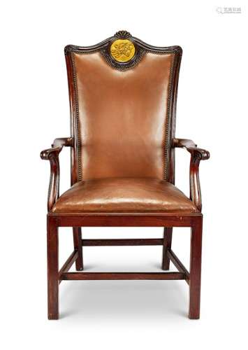 A 19th century George III style 'Master's' open armchair