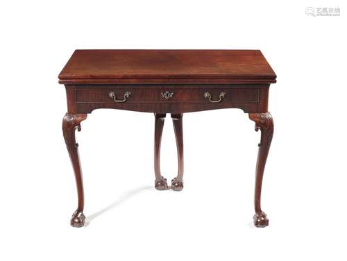 A George III Irish carved mahogany gate-leg tea table