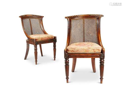 A pair of Regency simulated rosewood bergère side chairs