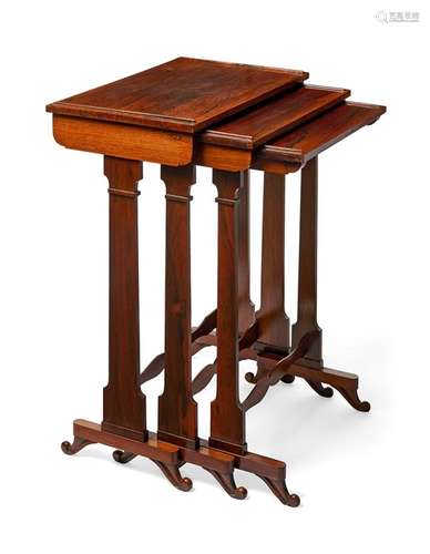 A nest of three William IV rosewood occasional tables by Wil...