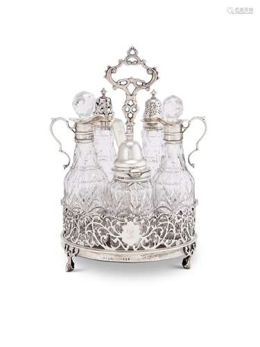 A Victorian silver five-bottle cruet by E. & J. Barnard, Lon...