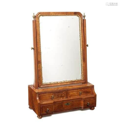 A George I walnut, crossbanded and featherbanded toilet mirr...