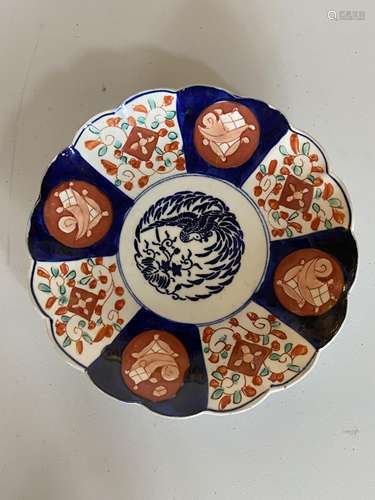 Ten various 19th century Imari dishes and a small charger