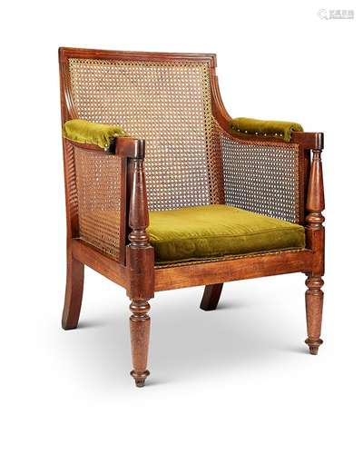 A Regency mahogany bergère chair attributed to Gillows