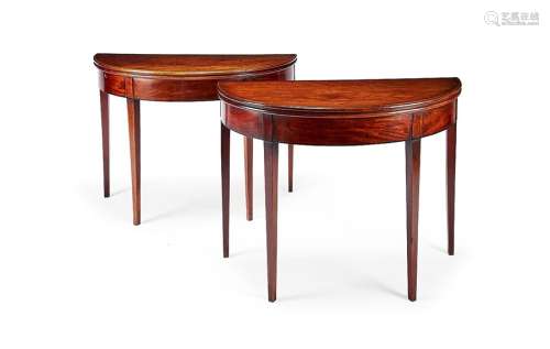 A pair of George III mahogany demi-lune tea tables