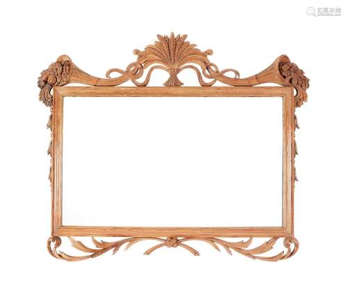 A George III pine carved landscape mirror