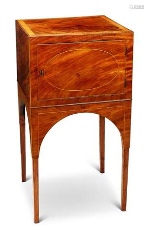 A George III mahogany and satinwood banded pot cupboard