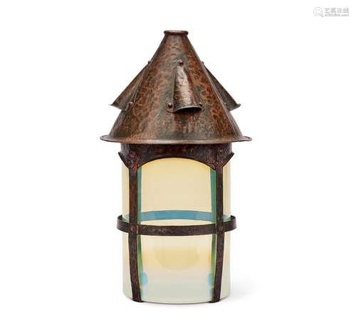 A late 19th century Arts & Crafts hammered copper lantern