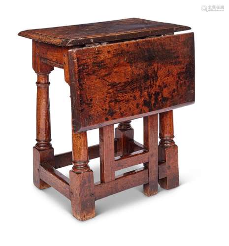 A Charles II oak joined stool / table