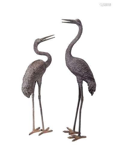 A pair of large 20th century bronze standing garden storks