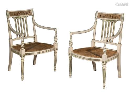 A pair of George III white and green painted open armchairs