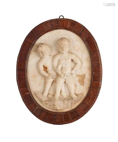 A mid 19th century white marble plaque of two young naked bo...