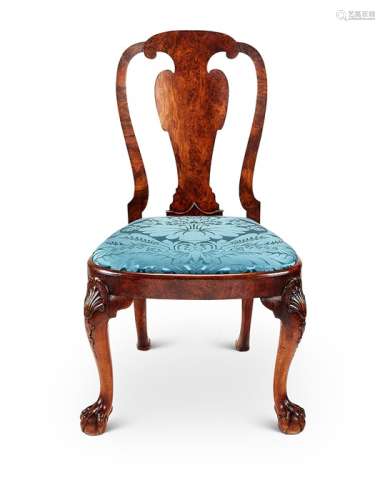 A George II carved walnut side chair in the manner of Giles ...