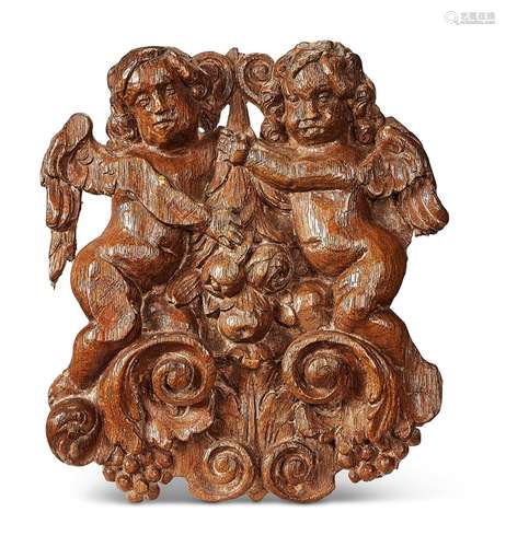 A small carved oak plaque, German, circa 1700