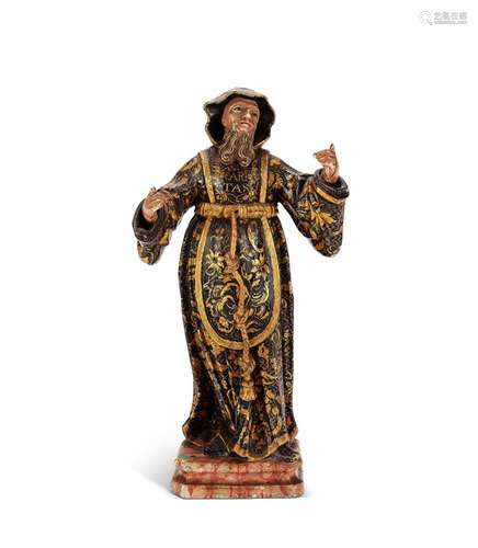 An 18th century polychrome and parcel gilt figure of a saint