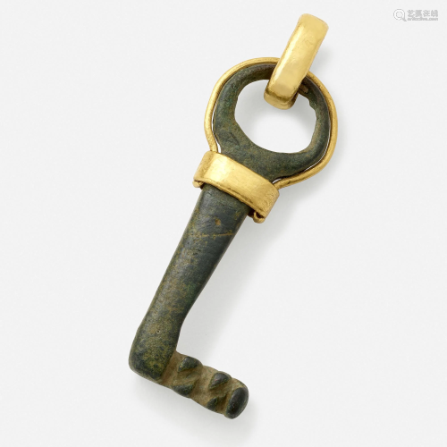 Ancient bronze and gold key pendant