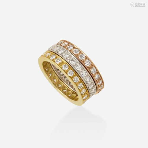 Three diamond eternity band rings