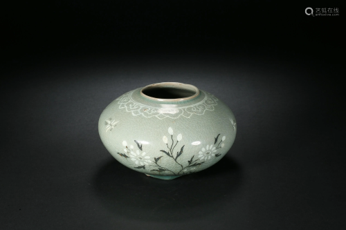 Celadon-glazed Plum Blossom Small Jar in Song Dynasty