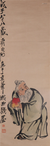A CHINESE PAINTING OF AN OLD MAN HOLDING A PEACH