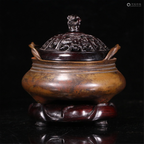 A CHINESE BRONZE INCENSE BURNER WITH DOUBLE HANDLES
