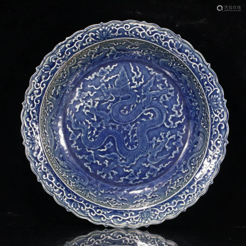 A CHINESE BLUE GLAZED PORCELAIN DRAGON DISH