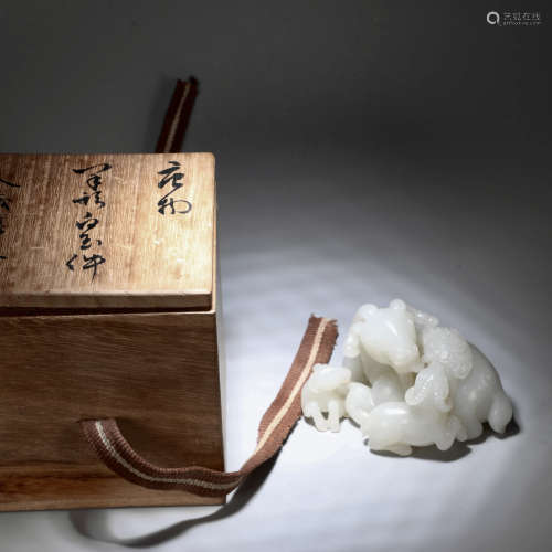 A CHINESE WHITE JADE PAPER-WEIGHT WITH THREE SHEEPS