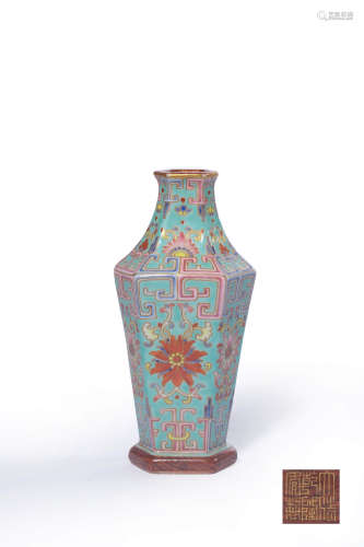 A TURQUOISE-GROUND INTERLOCKING LOTUS HEXAGONAL VASE