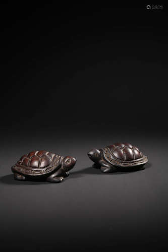 A PAIR OF SANDALWOOD TURTLE-FORM PAPER WEIGHTS