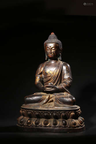 A GILT BRONZE STATUE OF MEDICINE BUDDHA