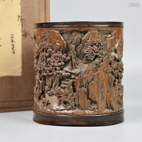 A CHINESE CARVED BAMBOO FIGURES BRUSH POT