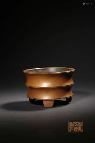 A BRONZE BAMBOO-FORM TRIPOD INCENSE BURNER