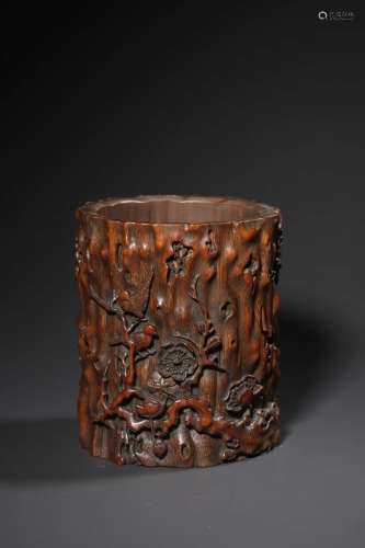 A CARVED BAMBOO PRUNUS AND MAGPIE BRUSH POT