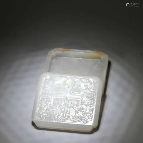A CHINESE WHITE JADE BOX WITH ANIMAL PATTERN