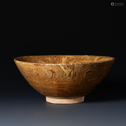 Yellow glazed rubber tire bowl in Tang Dynasty