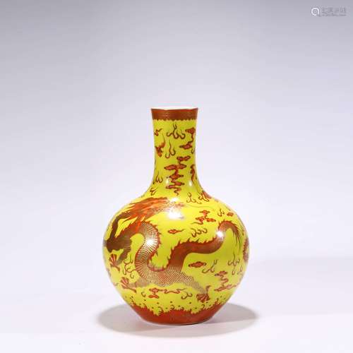 A Yellow-Ground And Iron-Red-Glaze Dragon And Phoenix Tianqi...