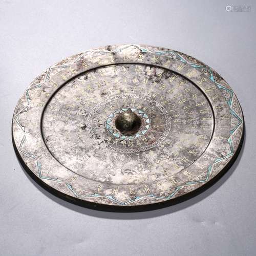 A Bronze Sanskrit Circular Mirror