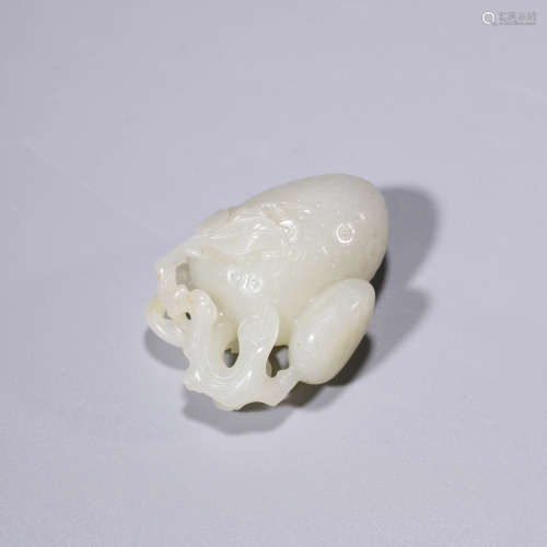 A Carved White Jade Lychee Ornament