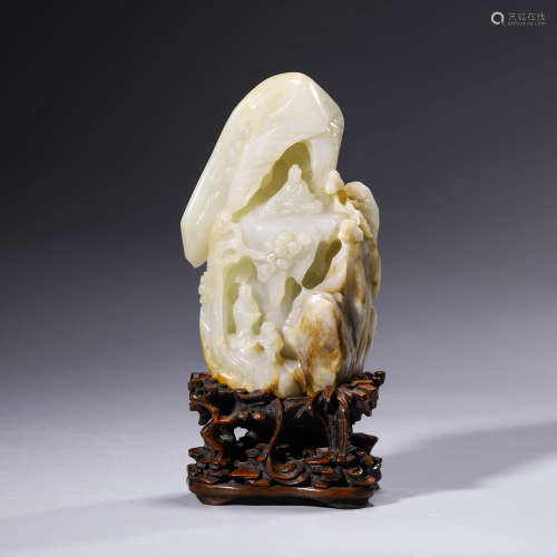 A Carved White Jade Child And Scholar Boulder
