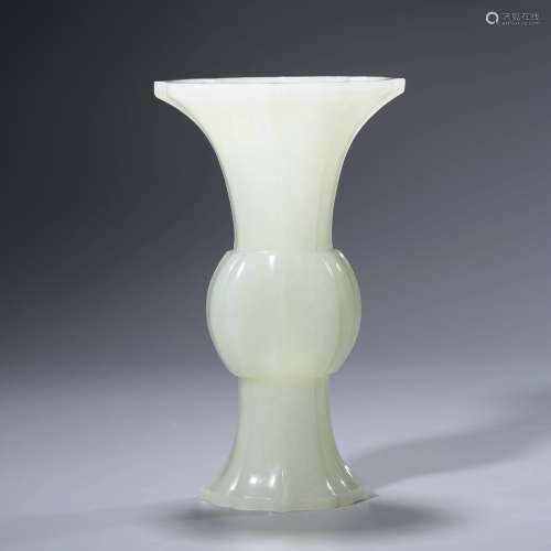 A Carved White Jade Beaker Vase