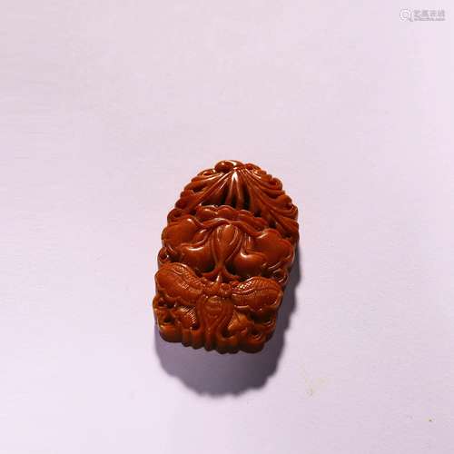 A Carved Beeswax Ornament