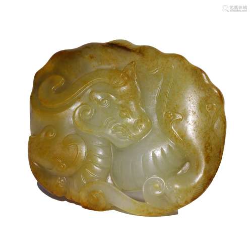 A Carved Russet Jade Beast Ornament